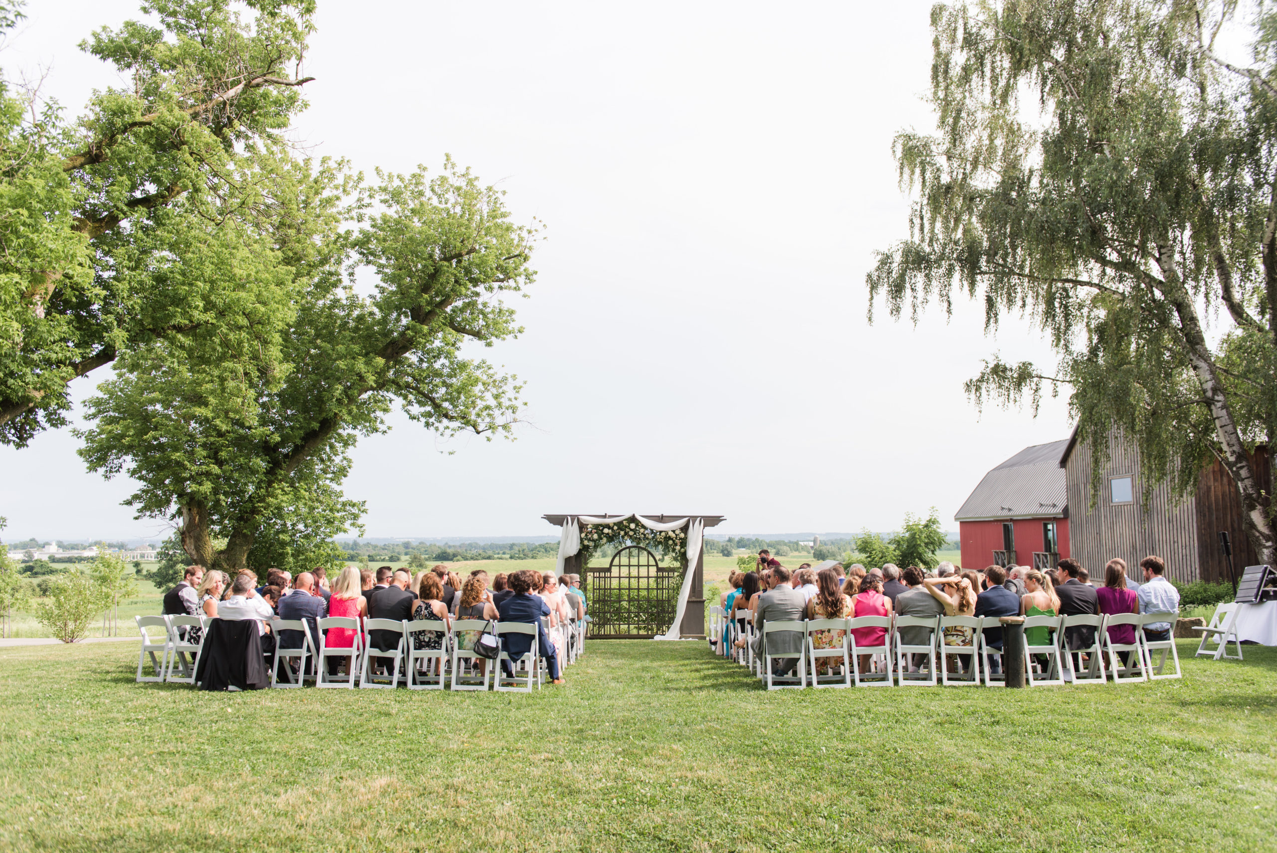 outdoor wedding ceremony at earth to table the farm