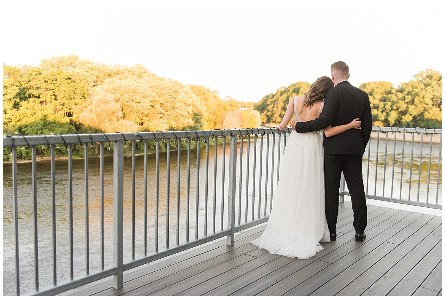 bride and groom overlooking the grand river